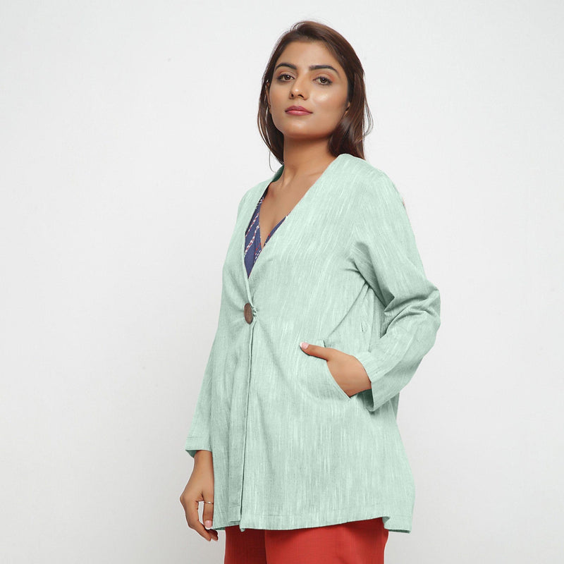 Left View of a Model wearing Aqua 100% Cotton Flared Short Jacket