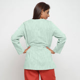 Back View of a Model wearing Aqua 100% Cotton Flared Short Jacket