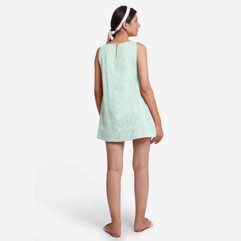 Back View of a Model wearing Aqua 100% Cotton Sleeveless Mini Tunic