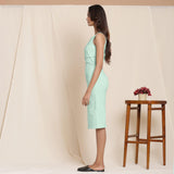 Left View of a Model wearing Aqua Knee Length Cotton Sheath Dress