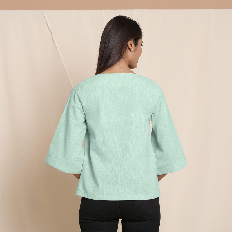 Back View of a Model wearing Aqua Comfy Straight Top