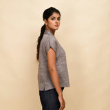 Right View of a Model wearing Ash Grey Deep Neck Button-Down Top