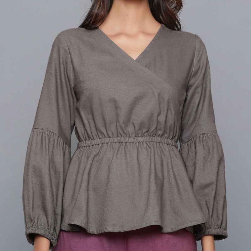 Front Detail of a Model wearing Ash Grey V-Neck Flannel Peplum Top