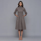 Front View of a Model wearing Ash Grey Flannel High Neck Midi Dress