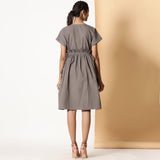 Back View of a Model wearing Warm Ash Grey Flannel Bohemian Frilled Dress