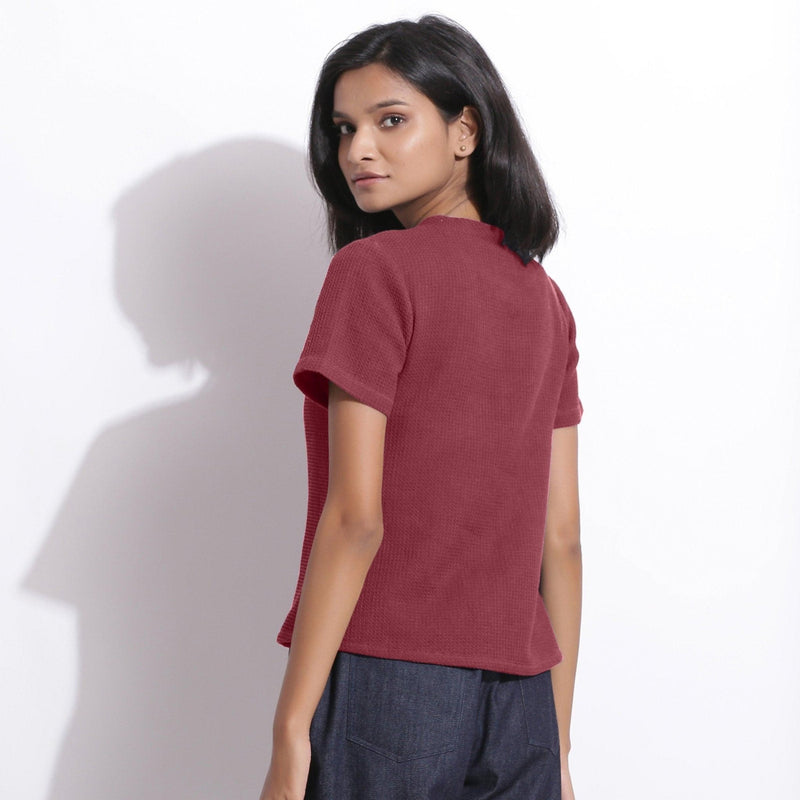 Back View of a Model wearing Barn Red Cotton Waffle Woven T-Shirt