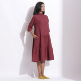 Right View of a Model wearing Barn Red Waffle High Neck Tier Dress