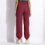 Back View of a Model wearing Comfy Barn Red Cotton Waffle Jogger Pants