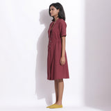 Left View of a Model wearing Cotton Waffle Barn Red Coat Dress