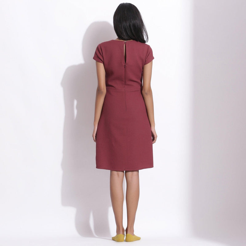 Back View of a Model wearing Barn Red Cotton Waffle V-Neck Dress