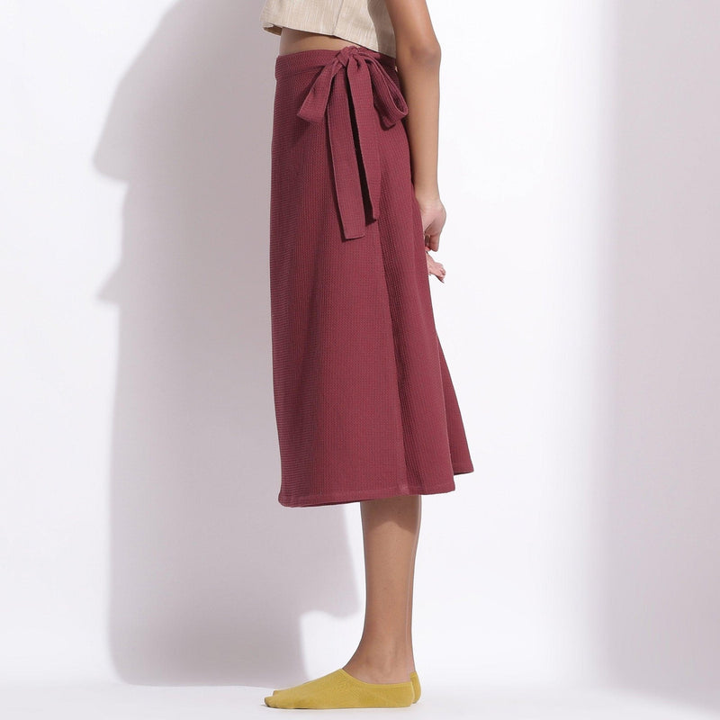 Left View of a Model wearing Barn Red Cotton Waffle Wrap Skirt