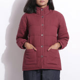 Front Detail of a Model wearing Barn Red Waffle Quilted Puffer Jacket