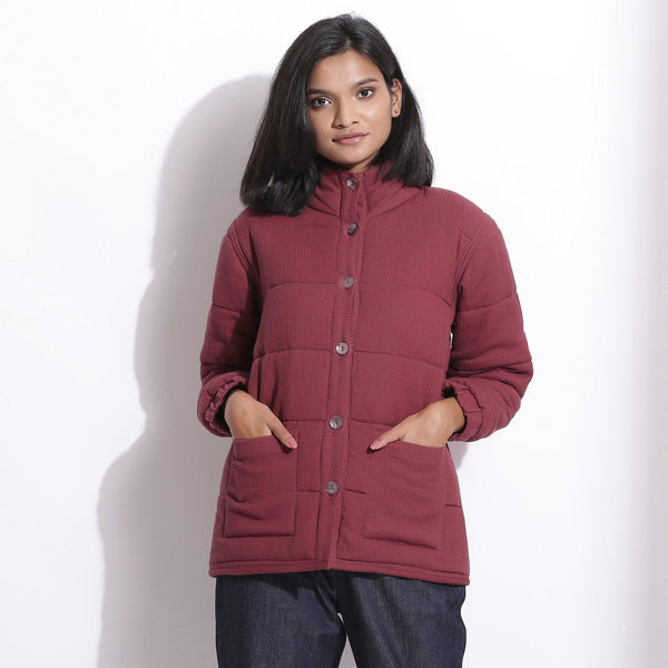 Front View of a Model wearing Barn Red Waffle Quilted Puffer Jacket