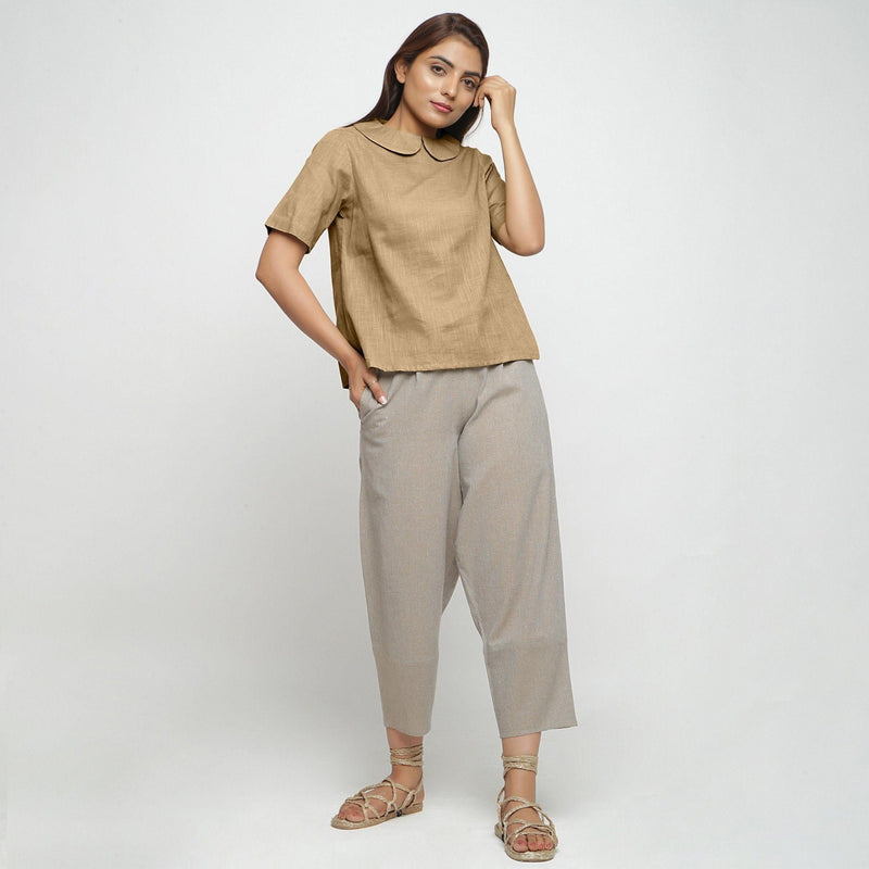 Front View of a Model wearing Beige Everyday Essential A-Line Top