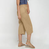 Right View of a Model wearing Beige Cotton High Rise Culottes