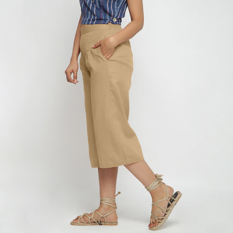 Left View of a Model wearing Beige Cotton High Rise Culottes