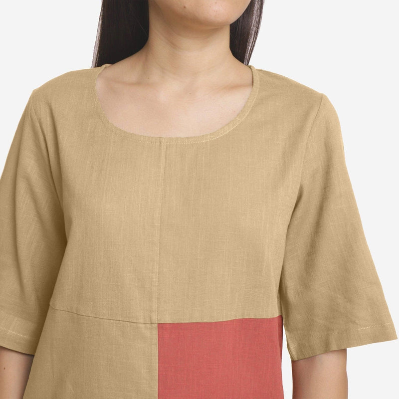 Front Detail of a Model wearing Comfy and Beige Brick Red Straight Top