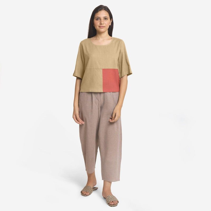 Front View of a Model wearing Comfy and Beige Brick Red Straight Top