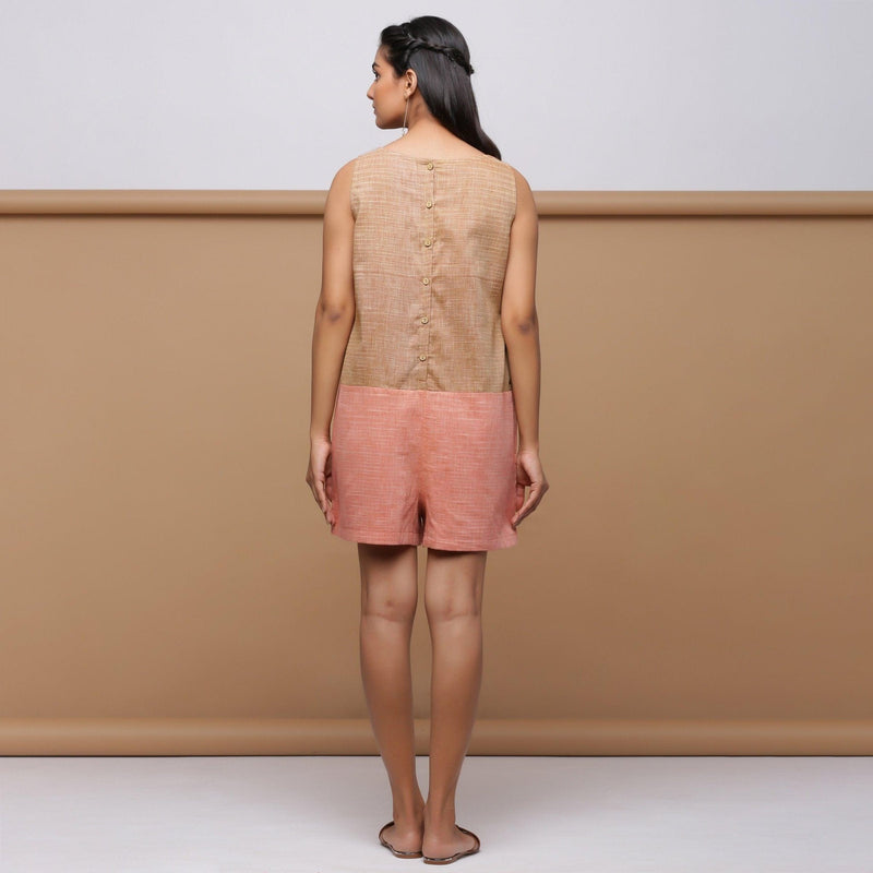 Back View of a Model wearing Handspun Yoked Sleeveless Romper