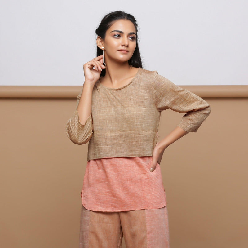 Front View of a Model wearing Handspun Beige Yoked Round Hem Top