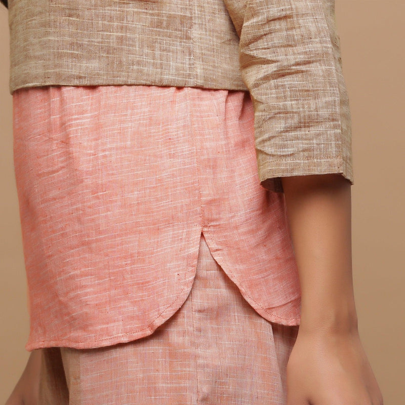 Close View of a Model wearing Handspun Beige Yoked Round Hem Top