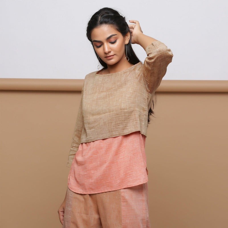 Front View of a Model wearing Handspun Beige Yoked Round Hem Top