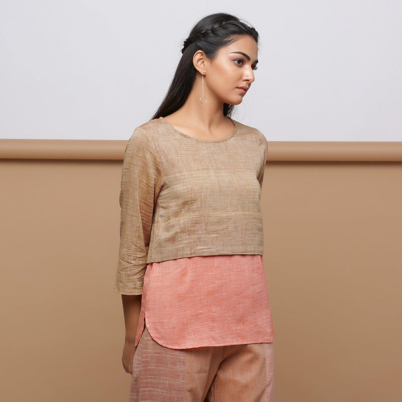 Right View of a Model wearing Handspun Beige Yoked Round Hem Top