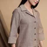 Front Detail of a Model wearing Beige Relaxed Fit Button Down Shirt