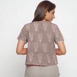 Back View of a Model wearing Beige Dabu Print Relaxed Sleeves Button-Down Top