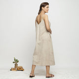 Back View of a Model wearing Dabu Hand-Lep A-Line Beige Dress