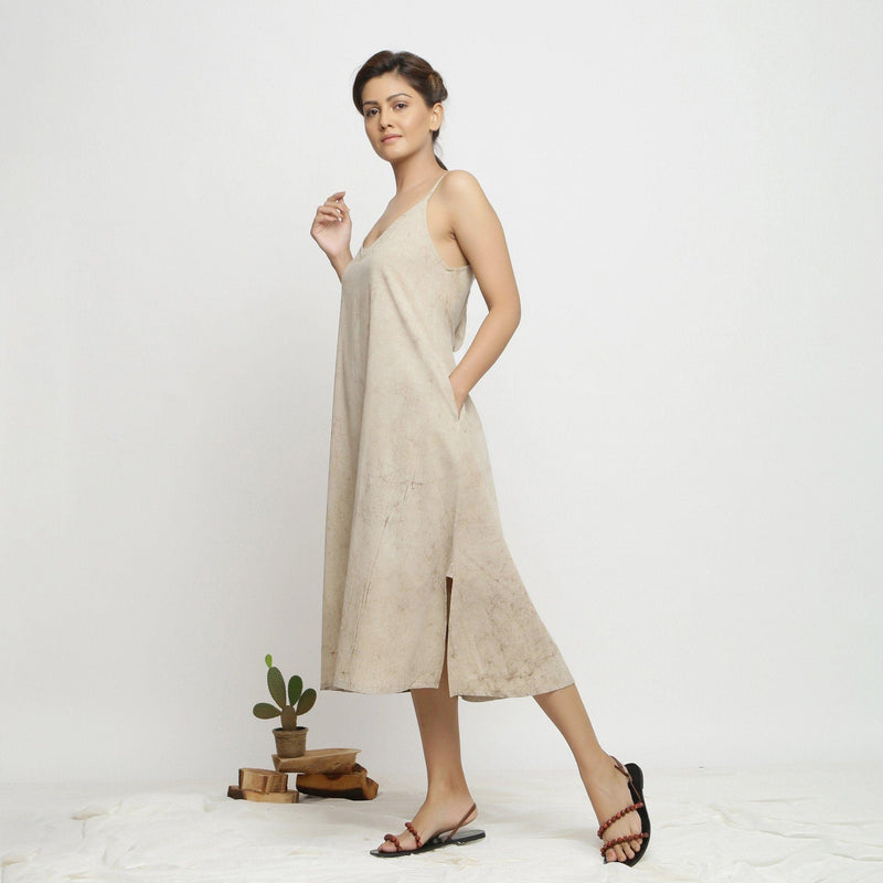 Left View of a Model wearing Dabu Hand-Lep A-Line Beige Dress