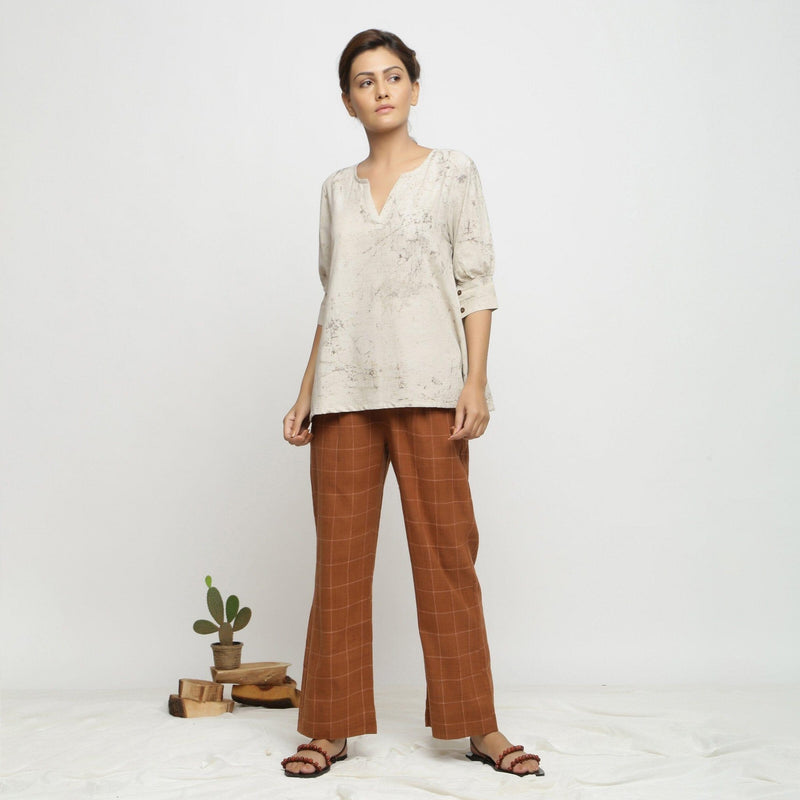 Front View of a Model wearing Beige Dabu Printed Deep Neck A-Line Top