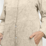 Front Detail of a Model wearing Dabu Printed Natural Dyed Beige Top