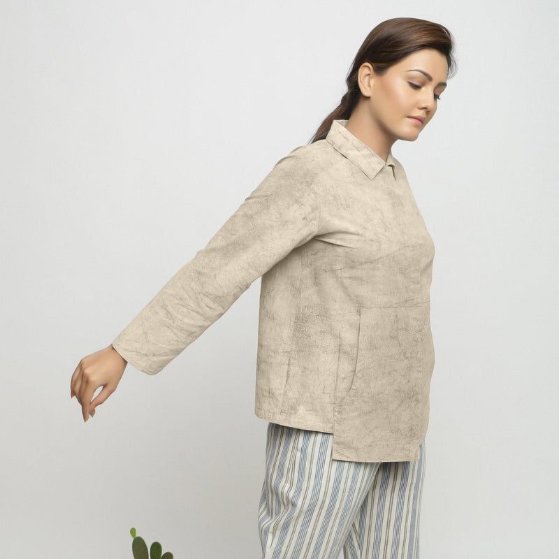 Right View of a Model wearing Dabu Printed Natural Dyed Beige Top