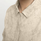 Front Detail of a Model wearing Dabu Printed Natural Dyed Beige Top