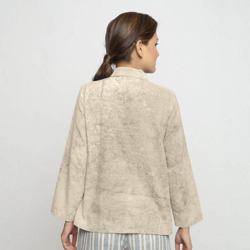 Back View of a Model wearing Dabu Printed Natural Dyed Beige Top