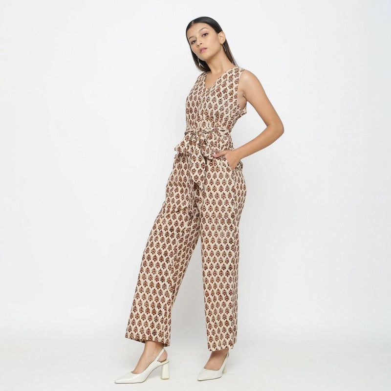 Left View of a Model wearing Bagru Print Beige Floral Jumpsuit