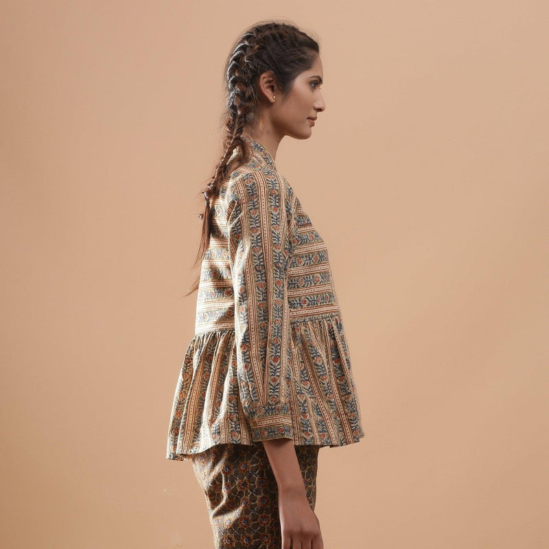 Right View of a Model wearing Warm Striped Floral Kalamkari Shirt