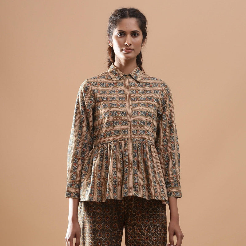 Front View of a Model wearing Warm Striped Floral Kalamkari Shirt