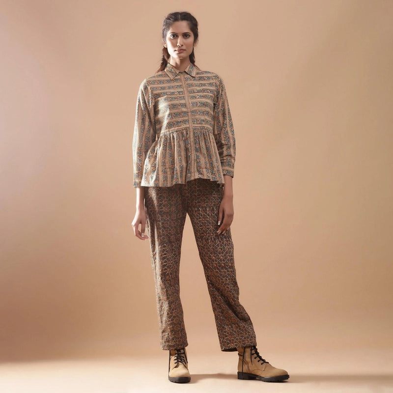 Front View of a Model wearing Beige Floral Warm Block Print Cotton Shirt