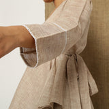 Close View of a Model wearing Beige Handspun Full Sleeve V-Neck Wrap Top