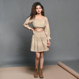 Front View of a Model wearing Beige Handwoven Cotton Frilled Crop Top