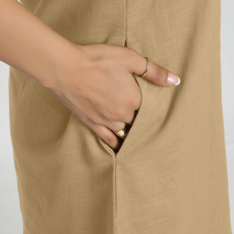 Right Detail of a Model wearing Beige Criss-Cross Cotton A-Line Dress