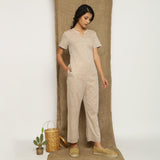 Beige Laced Cotton Muslin Split Neck Paneled Jumpsuit