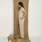 Beige Laced Cotton Muslin Split Neck Paneled Jumpsuit