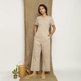 Beige Laced Cotton Muslin Split Neck Paneled Jumpsuit