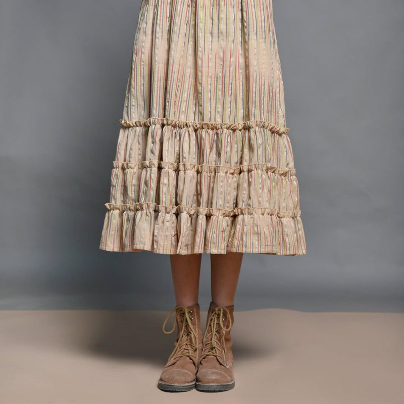 Close View of a Model wearing Beige Striped Handwoven Cotton Boho Tier Dress