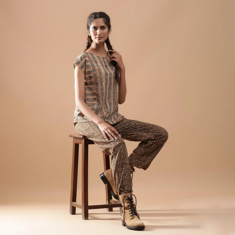 Right View of a Model wearing Beige Kalamkari A-Line Striped Top