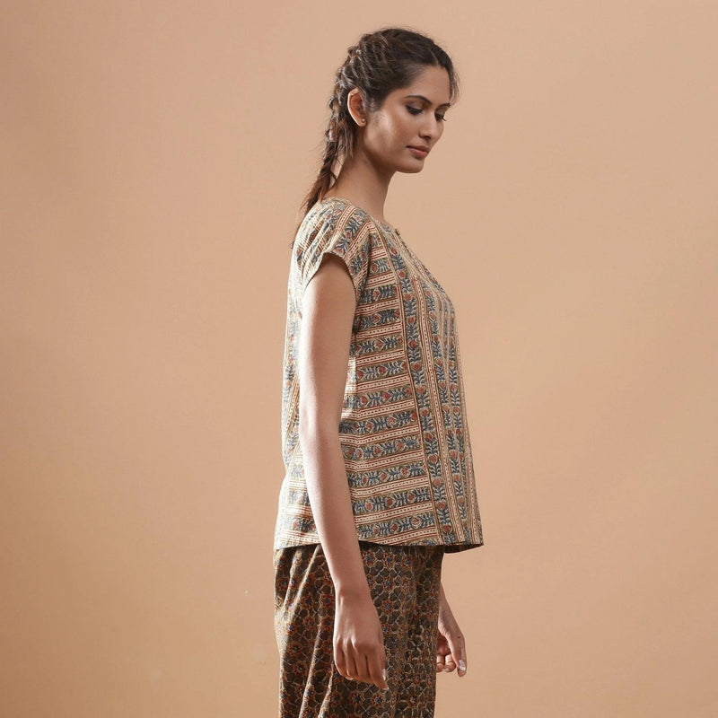 Right View of a Model wearing Beige Kalamkari A-Line Striped Top