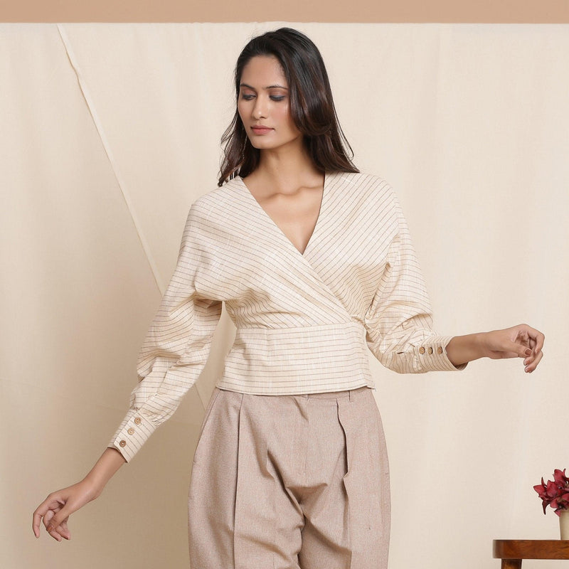 Front View of a Model wearing Beige Striped Surplice Neck Cotton Blouson Wrap Top